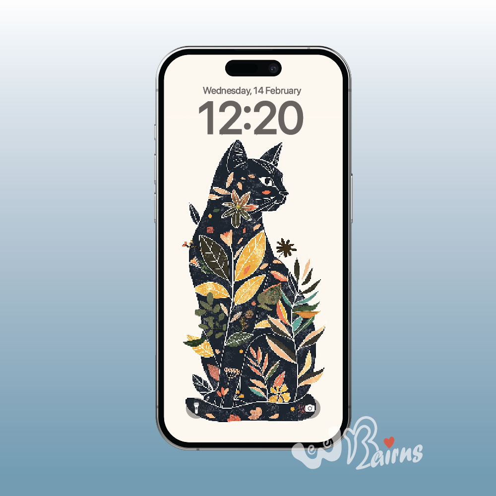 Picture shows a black cat looking right surrounded by colourful leaves.