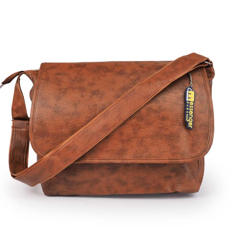 Leather messenger bag photographed on a white background.