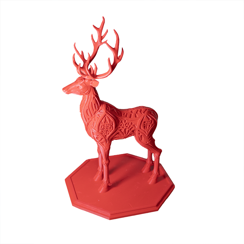 3D printed stag model with detailed antlers, displayed on a plinth. 